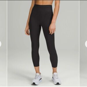 Lululemon Base Pace High-Rise Tight 23" *Ribbed Nulux
Black Size 12